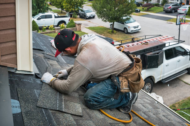 Professional Roofing technician working in Oakland, IA